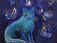 Katze mit Kugeln